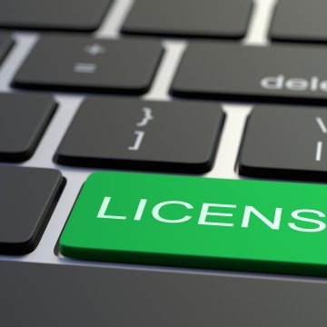 restoro software system optimizer green llicense key on laptop keyboard